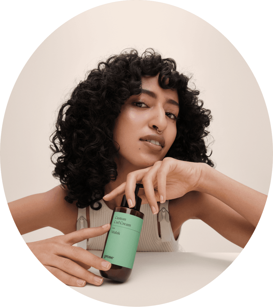 Prose model posing with custom curl cream