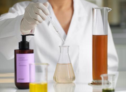 Prose scientist testing products in lab